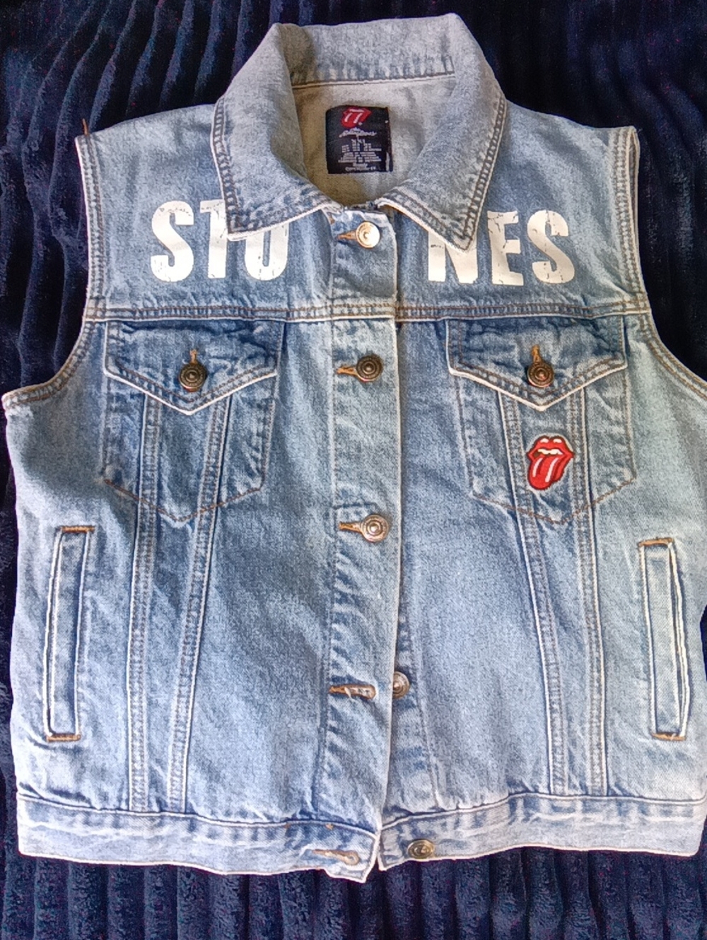 the Rolling Stones Light Blue Denim Vest with Red Tongue Patch